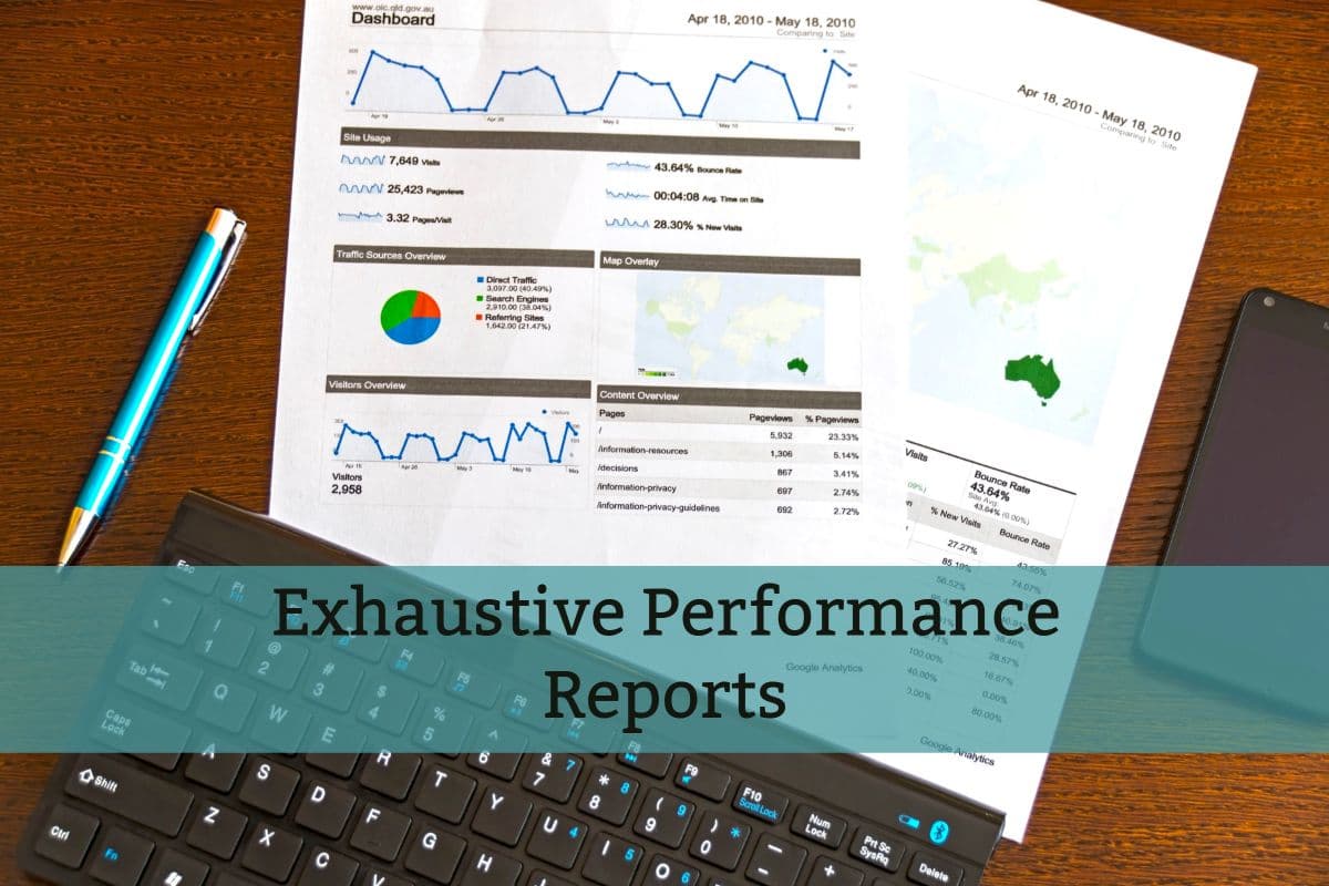 Printed analytics reports on a desk captioned Exhaustive Performance Reports
